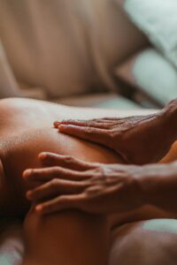 A soothing back massage session in a spa setting, focusing on wellness and relaxation.